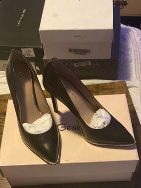 BCBG Black Pointed Toe Pumps with Gold Trim